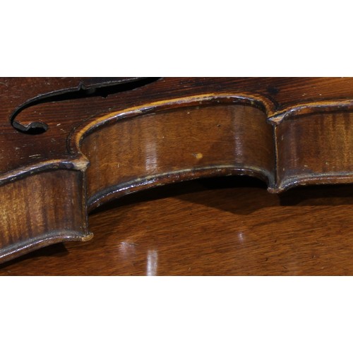 711 - Musical Instruments - a violin, the two-piece back 35.5cm excluding button, ebonised tuning pegs, ou... 