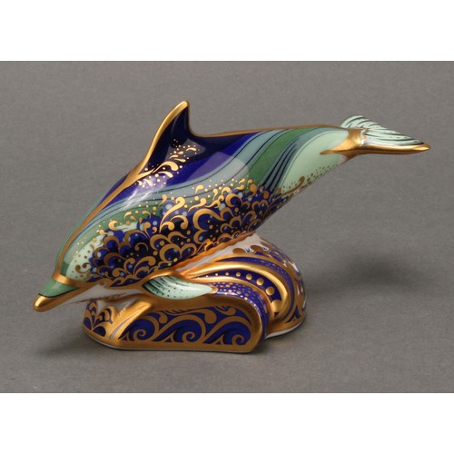 69 - A pair of Royal Crown Derby paperweights, Baby Bottlenose Dolphin, 12cm long, silver stopper, and Sl... 