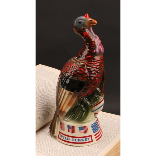 17 - Americana & Spirits - a 1970s American commemorative whiskey decanter, by Austin Nichols, cast as a ... 