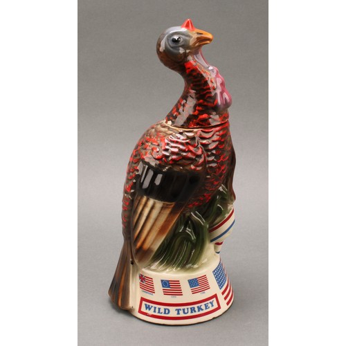 17 - Americana & Spirits - a 1970s American commemorative whiskey decanter, by Austin Nichols, cast as a ... 