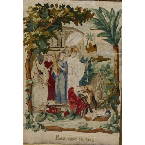 42 - A 19th century Berlin woolwork panel, depicting Moses in the Bulrushes, dated 1876, embroidered Moïs... 