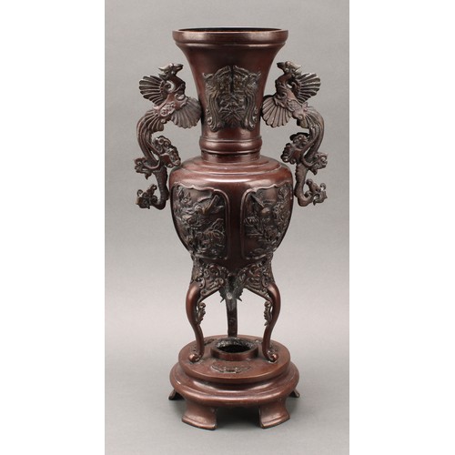 44 - A pair of large Japanese Meiji period patinated bronze shouldered vases on stands, the tapering neck... 