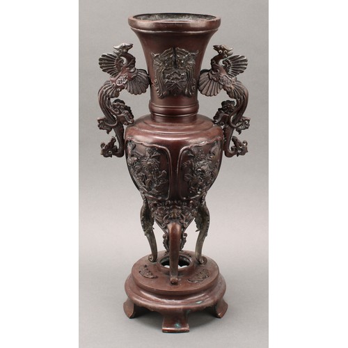 44 - A pair of large Japanese Meiji period patinated bronze shouldered vases on stands, the tapering neck... 