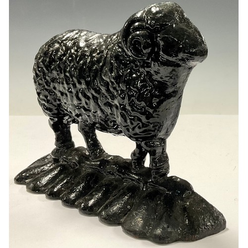 720 - A cast iron novelty door stop, as a sheep, 23cm wide