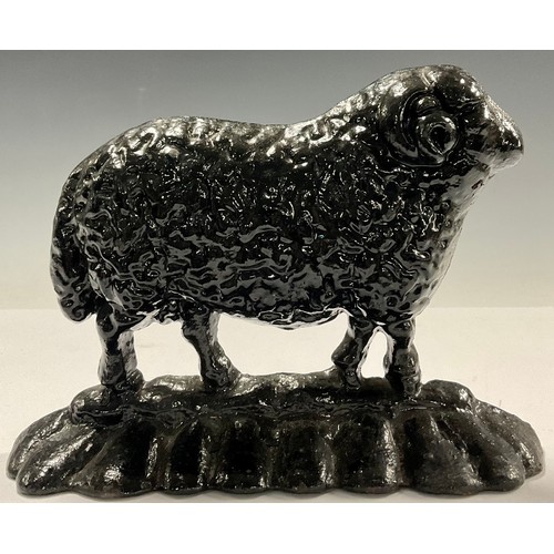 720 - A cast iron novelty door stop, as a sheep, 23cm wide