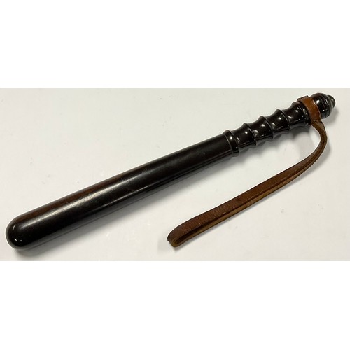 722 - An early 20th century turned lignum vitae police truncheon, 39cm long