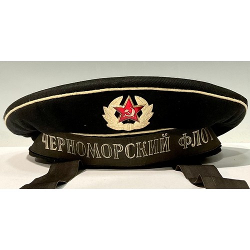 743 - Militaria - a USSR Naval cap/hat, with ribbon and enamelled cap badge