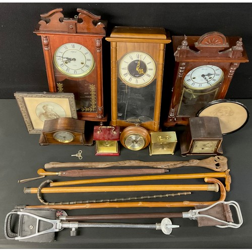 747 - A horn handled cane; a silver mounted school cane; shooting sticks; a Lincoln 31 Day wall clock, twi... 