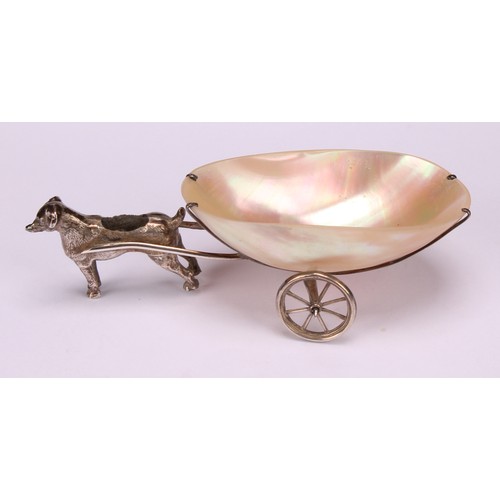 771 - An Edwardian silver novelty pin cushion, as a dog pulling a mother of pearl cart, 11.5cm long, Levi ... 