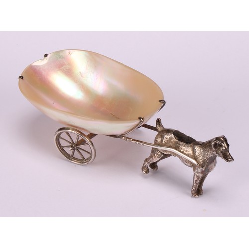 771 - An Edwardian silver novelty pin cushion, as a dog pulling a mother of pearl cart, 11.5cm long, Levi ... 