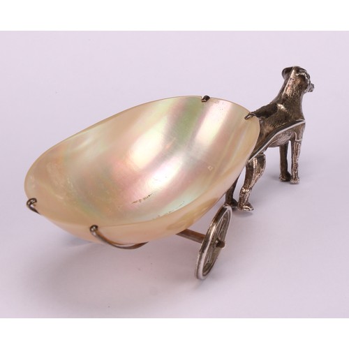 771 - An Edwardian silver novelty pin cushion, as a dog pulling a mother of pearl cart, 11.5cm long, Levi ... 