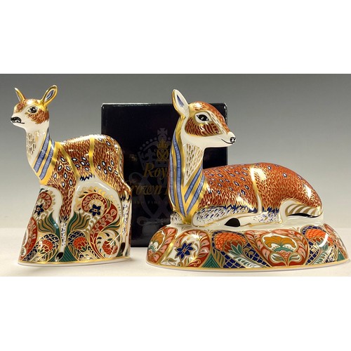 74 - A pair of Royal Crown Derby paperweights, Roe Deer and Fawn, Royal Crown Derby Collectors Guild excl... 