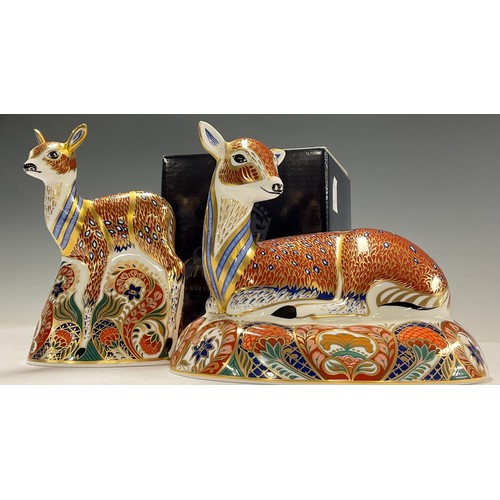 74 - A pair of Royal Crown Derby paperweights, Roe Deer and Fawn, Royal Crown Derby Collectors Guild excl... 