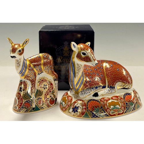 74 - A pair of Royal Crown Derby paperweights, Roe Deer and Fawn, Royal Crown Derby Collectors Guild excl... 