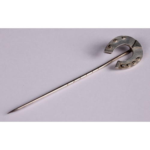 565A - Stick Pins - a silver horseshoe stick pin; a silver and turquoise stick pin in the form of a fruit; ... 