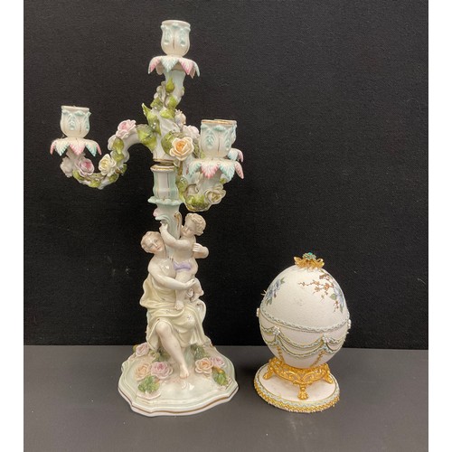 9 - A 19th century porcelain candelabra, with three branch section fitting on to a central column, with ... 