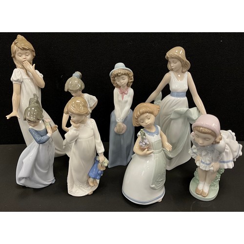 33 - Lladro/ Nao figures - Peek- a-Boo,  Potted Blooms, Walking on Air, My Rag Doll etc, printed and impr... 