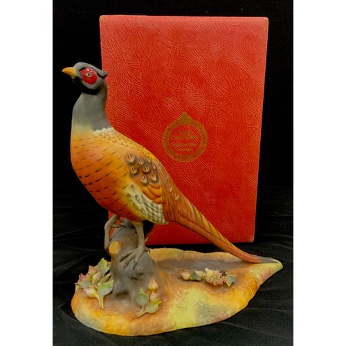 53 - A large Royal Crown Derby hand painted pheasant figure, factory mark to base, 27cm high, boxed.