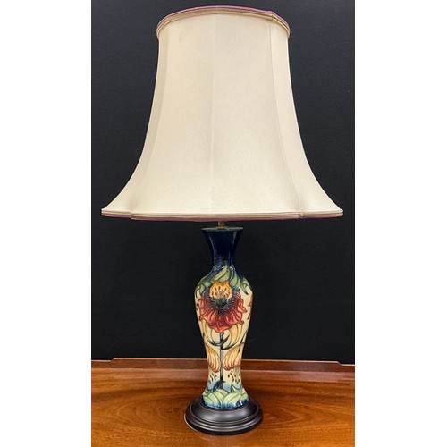 99 - A Moorcroft Anna Lily pattern baluster-form table lamp, 43cm high (65cm high with shade).