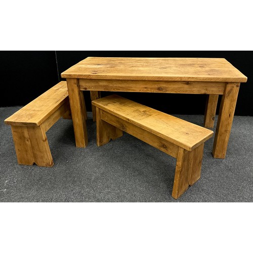 102 - A pine plank-top dining table, with matching pair of table bench seats, the table measuring 78cm hig... 