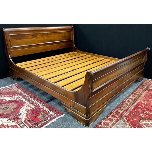 105 - A Willis and Gambier super-king ‘walnut’ bed frame,  (for mattress size 200cm long x 180cm wide).