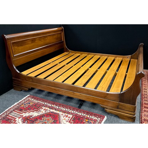 105 - A Willis and Gambier super-king ‘walnut’ bed frame,  (for mattress size 200cm long x 180cm wide).