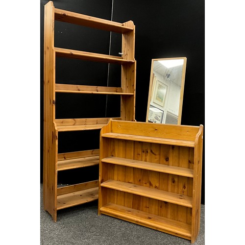 123 - A tall pine waterfall bookcase, six tiers of shelving, 198cm high x 93cm wide x 32.5cm deep; a small... 