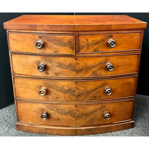 152 - A Victorian mahogany bow front chest of drawers, two short over three slightly graduated long drawer... 