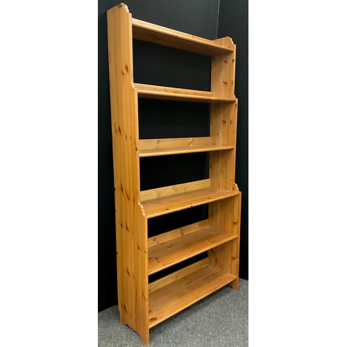 163 - A Pine waterfall six-tier bookcase, 198cm high x 92.5cm wide x 32.5cm deep.