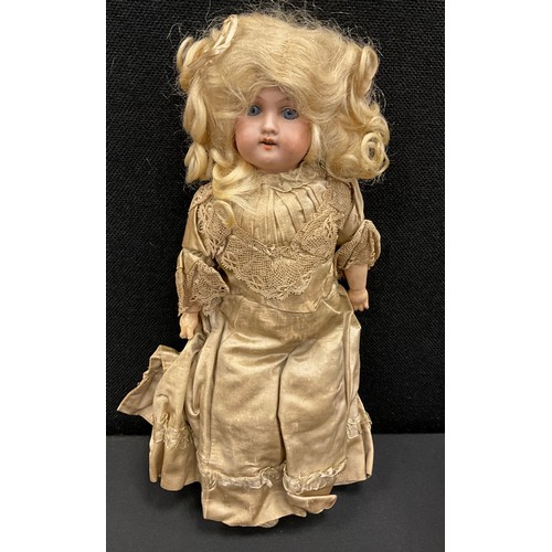 180 - An Armand Marseille Floradora child doll, with blue lashed sleeping eyes, open mouth blonde hair wig... 