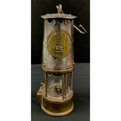 199 - An Eccles steel and brass miner’s lamp, the protector lamp & lighting company Ltd., type SL, no. B/1... 