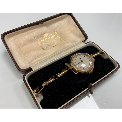 237 - A lady's 9ct gold cased Visible wristwatch, silvered dial, Arabic numerals, Birmingham 1926 import m... 