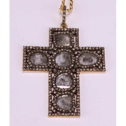 243 - A silver gilt diamond cross pendant, set with slice-cut and rose-cut diamonds, silver rope link chai... 