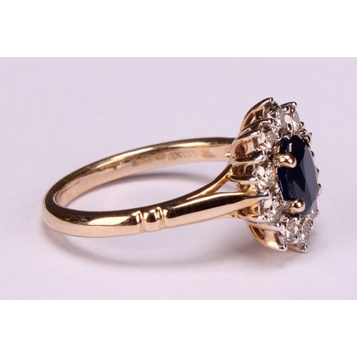 245 - A 9ct gold sapphire and diamond cluster ring, oval sapphire 1.00ct approx, round brilliant cut diamo... 