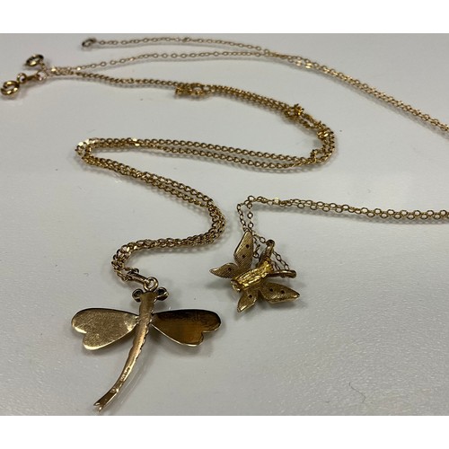 262 - A 9ct gold dragonfly pendant necklace, another butterfly, 5.1g gross