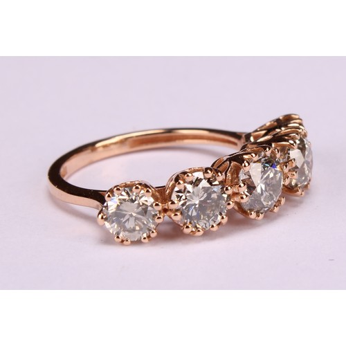 276 - An 18ct rose gold five stone diamond ring, graduated round brilliant cut diamonds 3.19ct, Cert no. W... 