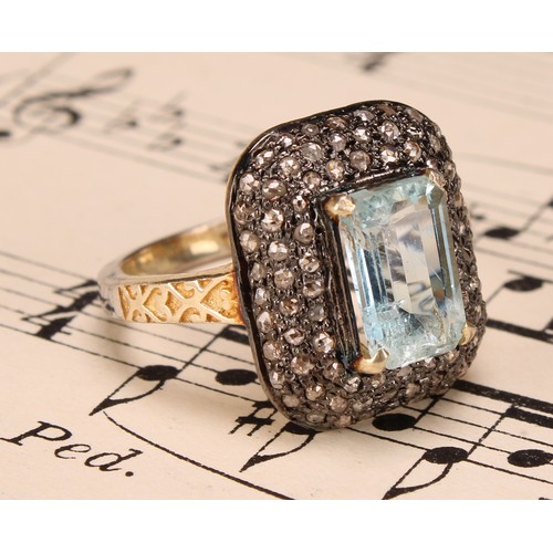 278 - A silver gilt aquamarine and diamond ring, aquamarine 2.10ct, diamonds 0.72ct, size O