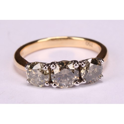 279 - An 18ct white and yellow gold three stone diamond ring, round brilliant cut diamonds 1.86ct. WGI Cer... 