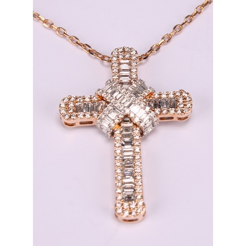 281 - An 18ct rose gold and diamond cross pendant, the whole encrusted with baguette and round brilliant c... 