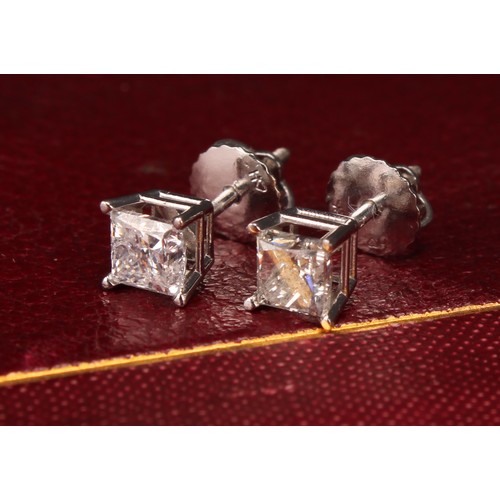 282 - A pair of 14ct white gold princess cut diamond solitaire studs, diamonds 0.90ct, Cert no. WGI9624148... 