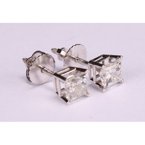 282 - A pair of 14ct white gold princess cut diamond solitaire studs, diamonds 0.90ct, Cert no. WGI9624148... 