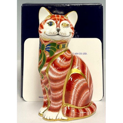 10 - A Royal Crown Derby paperweight, Cheshire Cat, limited edition 34/500, commissioned by John Sinclair... 