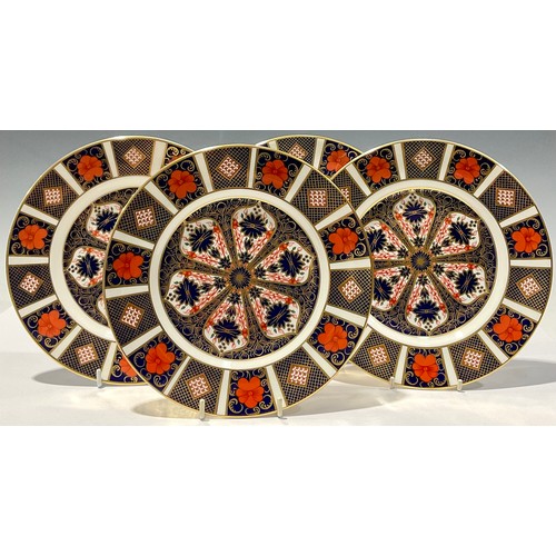 59 - A set of four Royal Crown Derby 1128 Imari pattern dessert plates, 21cm diameter, second quality (4)