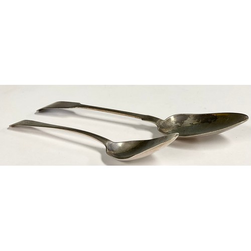 70 - A Channel Islands fiddle pattern silver table spoon, by Thomas de Gruchy (1776-1846), 21cm long; ano... 