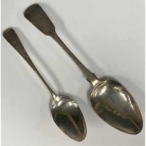 70 - A Channel Islands fiddle pattern silver table spoon, by Thomas de Gruchy (1776-1846), 21cm long; ano... 