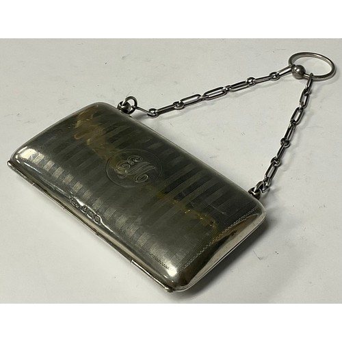 79 - A silver purse, the cartouche with initials 'EM'