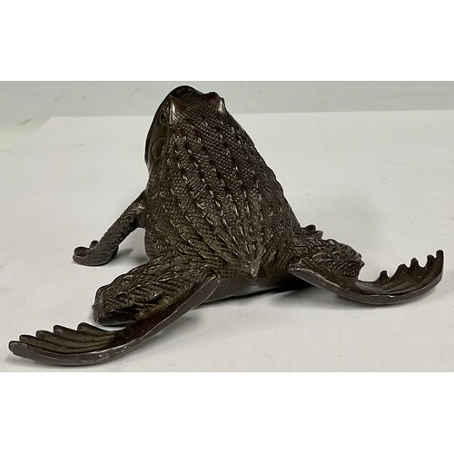 89 - A large bronzed study, of a toad, 16cm wide, 7cm high