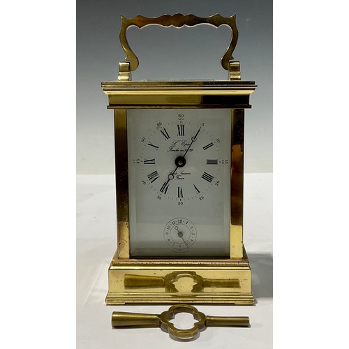 98 - A French L'Epee brass carriage clock, Roman and Arabic numerals on white dial, alarm setting chapter... 