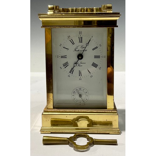 98 - A French L'Epee brass carriage clock, Roman and Arabic numerals on white dial, alarm setting chapter... 