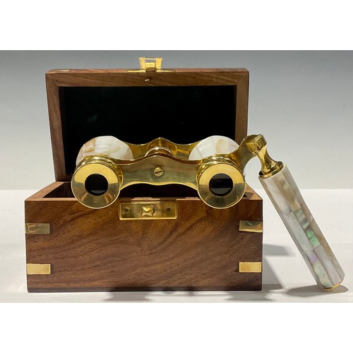 100 - A pair of contemporary mother of pearl and brass opera glasses, in metal bound box, the lid inlaid w... 